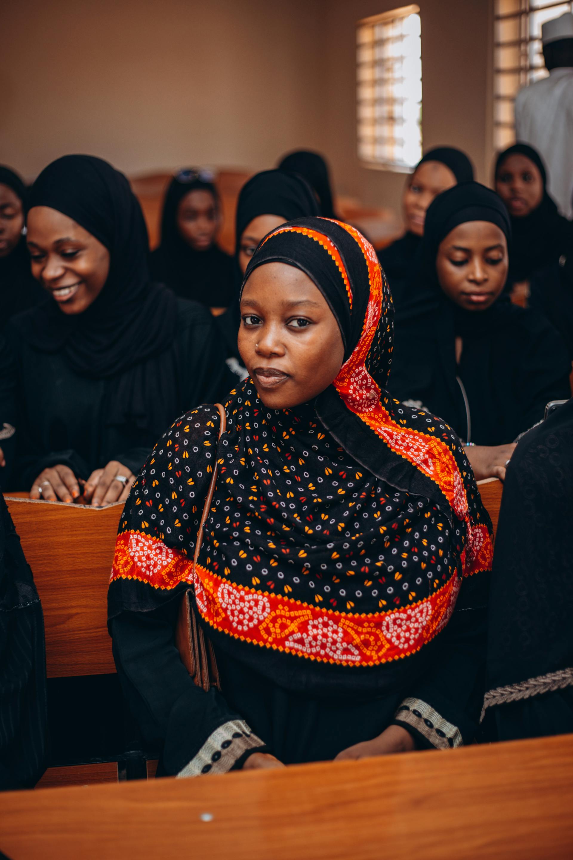 African women in a training session, sitting together in a classroom